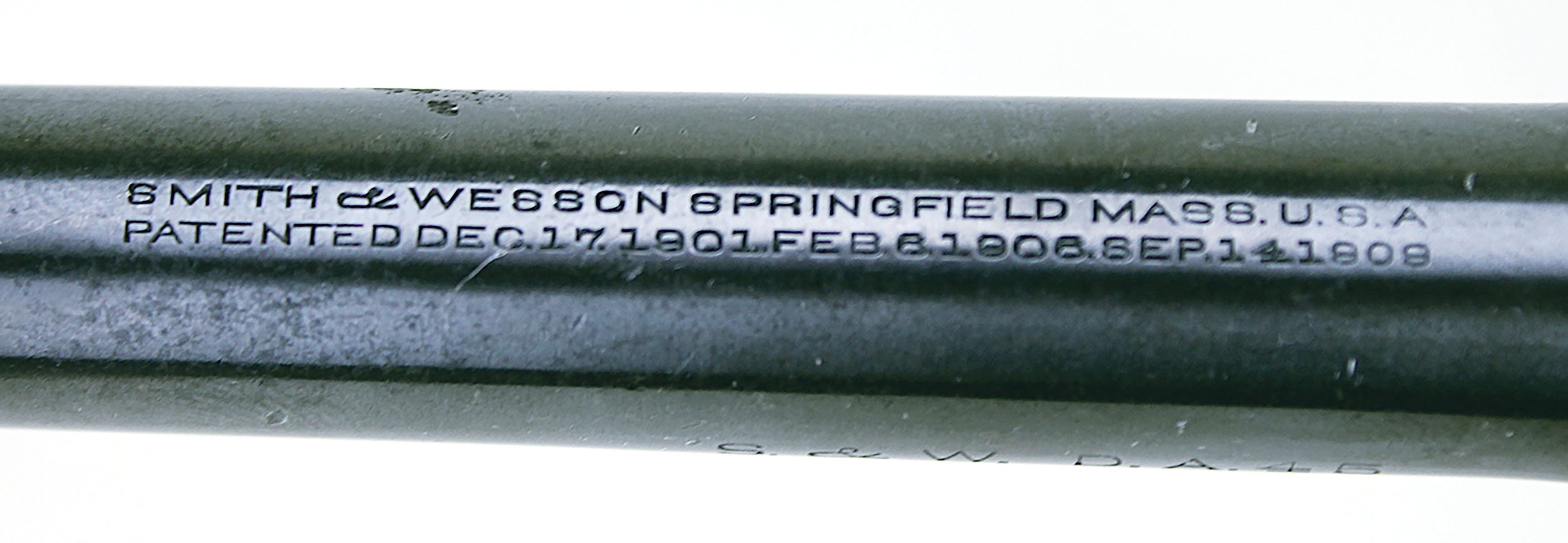 Other markings include the patent date on top of the barrel…